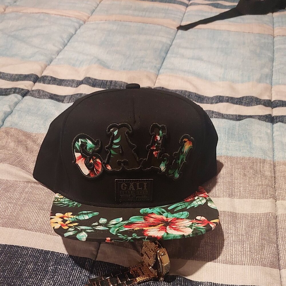brand: Top Level, size: any size, color: black and has flowers on it